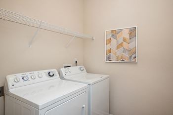 Carrington Place at Shoal Creek - Full-sized washer/dryers in every home